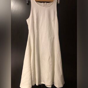 White sleeveless skater dress